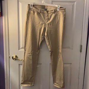 Beige jeans with slight golden sheen.
